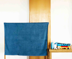 Folded Orange Cotton Towel by Idaman Suri