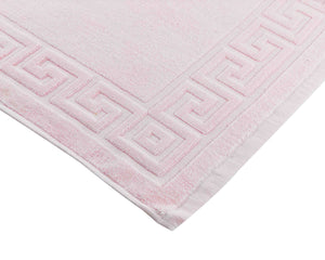 Opened light pink cotton bath mat by Idaman Suri