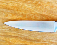 Close-up view of 1 Stainless Steel Chef Knife Blade by Idaman Suri
