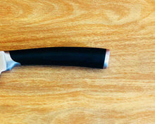 Close-up view of 1 Stainless Steel Santoku Knife Handle by Idaman Suri