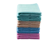 12 Folded Cotton Towels by Idaman Suri