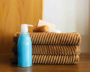3 Folded Brown Cotton Towels by Idaman Suri