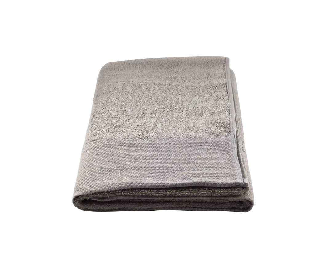 Folded Light Brown Cotton Towel by Idaman Suri