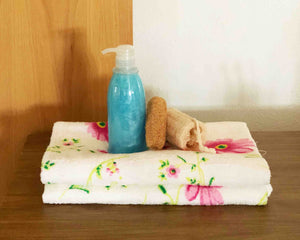 2 Folded Floral Cotton Towels by Idaman Suri